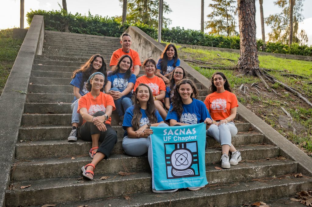 group photo with everyone in blue or orange t-shirts