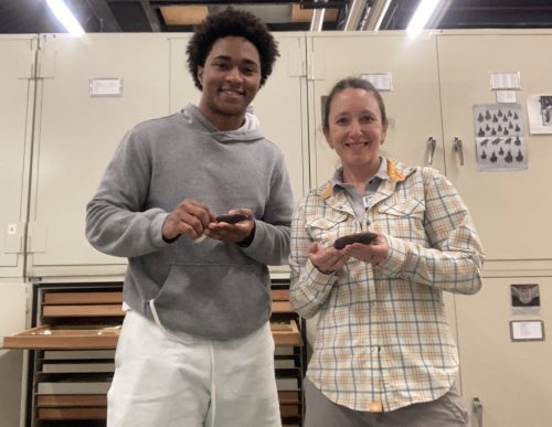 undergraduate Ryan and collections manager Verity holding some short-tailed shrews