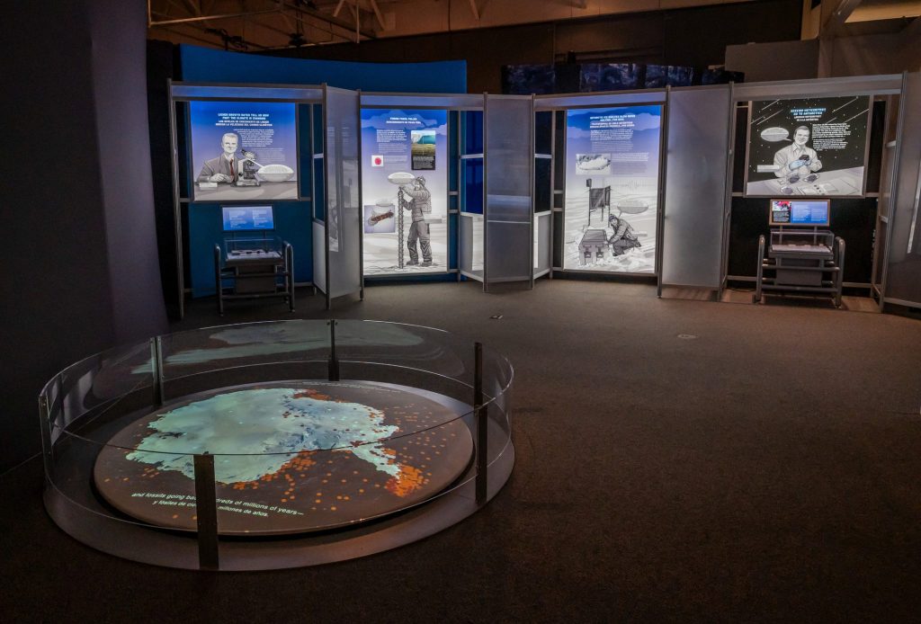 Antarctic Dinosaurs exhibit with illustrated displays showing the work done by scientists in the Antarctic