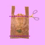 brown plastic bag with lines showing where to cut along the bottom of the handles and the bottom of the bag