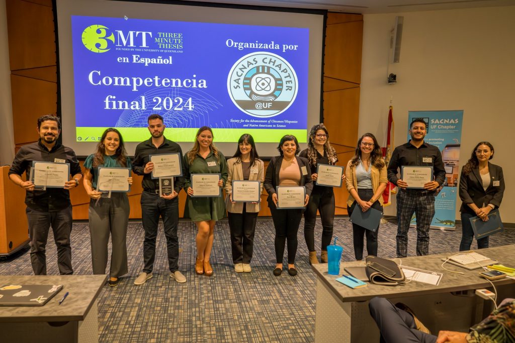 The contestants of the three minute thesis competition pose for a photo