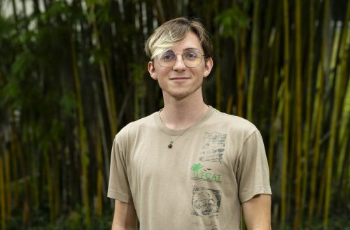 Levi in front of bamboo